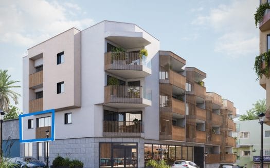 Modern apartment building with balconies and retail space on the ground floor.