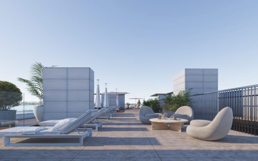 Rooftop lounge area with sofa chairs and marina view – Common Area of Palmera Oasis